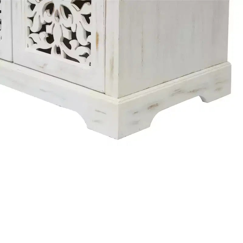Meuble de rangement buffet GDFStudio Isla antique de 110 cm avec 3 portes sculptées