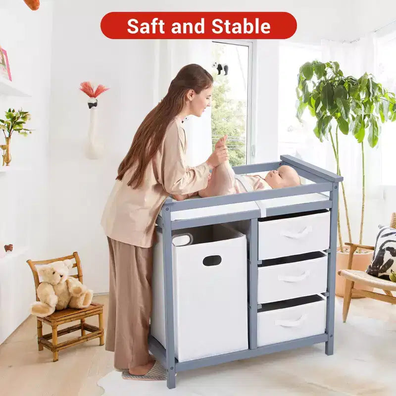 COZONY Table à langer en bois avec 3 tiroirs, panier à linge et matelas à langer, commode moderne pour bébés et nourrissons