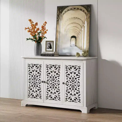Meuble de rangement buffet GDFStudio Isla antique de 110 cm avec 3 portes sculptées
