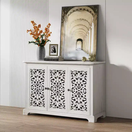 Meuble de rangement buffet GDFStudio Isla antique de 110 cm avec 3 portes sculptées