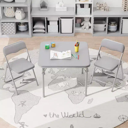 Ensemble table et deux chaises pliantes pour enfants, avec coussins en PU, facile à ranger, idéal pour les repas, la lecture et les jeux des enfants.