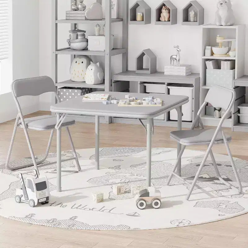 Ensemble table et deux chaises pliantes pour enfants, avec coussins en PU, facile à ranger, idéal pour les repas, la lecture et les jeux des enfants.