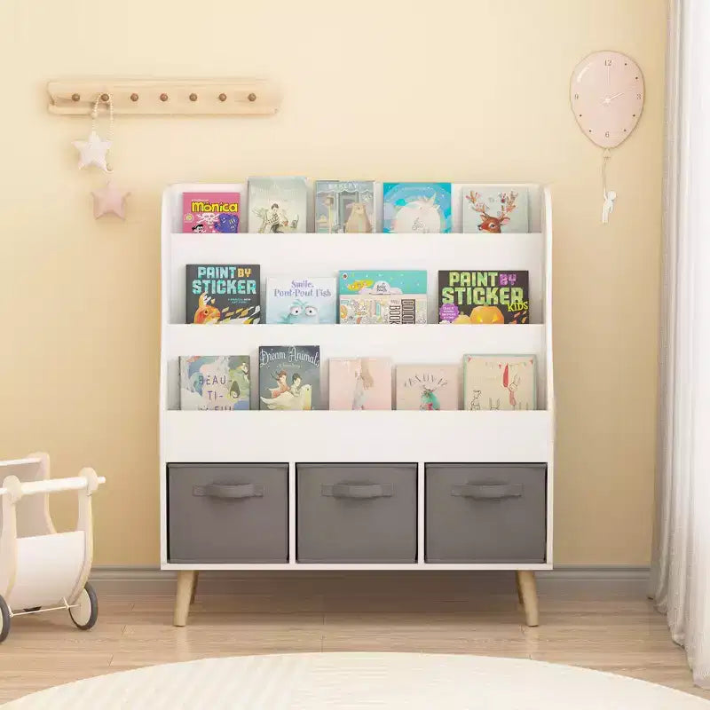 Bibliothèque Whisen Kids avec 3 bacs de rangement en tissu, présentoir de livres, porte-revues à l'avant avec pieds en pin - Blanc