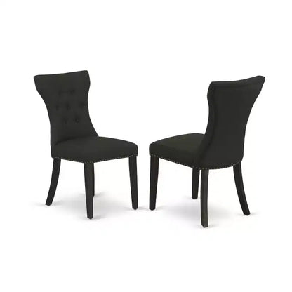 Ensemble de salle à manger HomeStock 5 pièces avec table ronde plateau en bois massif finition noire et 4 chaises rembourrées