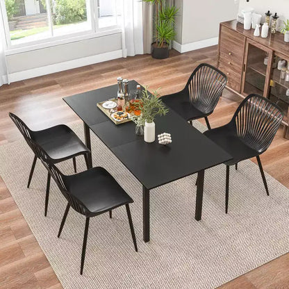 Costway Lot de 4 chaises de salle à manger en plastique avec pieds en métal, dossier ajouré et assise incurvée