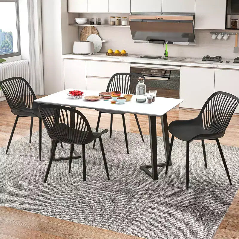 Costway Lot de 4 chaises de salle à manger en plastique avec pieds en métal, dossier ajouré et assise incurvée