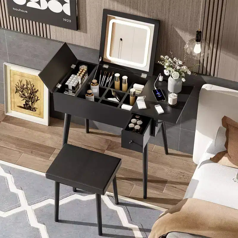 Coiffeuse moderne Okak avec miroir rabattable, table de maquillage avec station de charge et panneau pliable, coiffeuse compacte pour chambre à coucher, noir