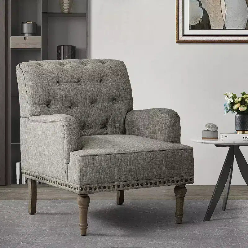 Fauteuil Naida avec pieds sculptés | ART OF LIVING DESIGNS-GRIS