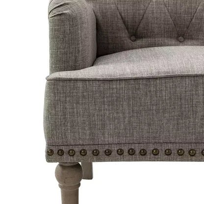 Fauteuil Naida avec pieds sculptés | ART OF LIVING DESIGNS-GRIS