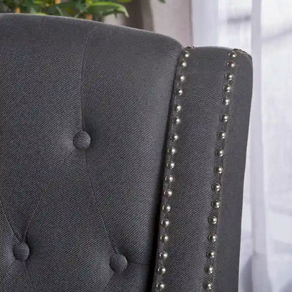 Fauteuil inclinable en tissu capitonné