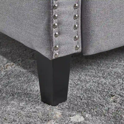 Fauteuil inclinable en tissu capitonné